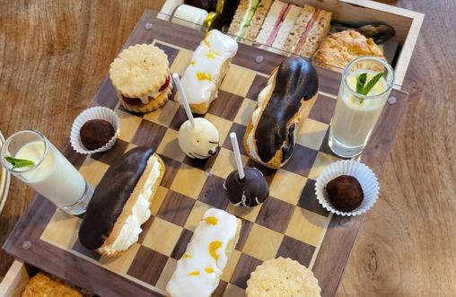50th Anniversary Afternoon Tea at House of Marbles - beautifully presented on one of our own Chess Boards!